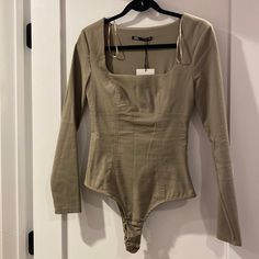 Brand New, Never Worn. Very Little Stretch. Stitching On Chest And Down The Bodice That Gives The Appearance Of Boning Zara Green Fitted Bodysuit, Casual Brown Cotton Bodysuit, Fitted Brown Long Sleeve Bodysuit, Zara V-neck Summer Bodysuit, Chic Zara V-neck Bodysuit, Asymmetric Bodysuit, High Cut Bodysuit, Silk Bodysuit, Zara Bodysuit