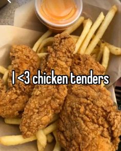 fried chicken tenders and french fries with ketchup on the side are shown