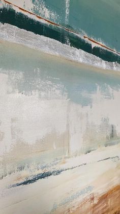 an abstract painting with blue, green and white colors on the wall next to a bench