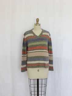 "vintage sweater made by a Liz clairborne company  shoulder:  18.5\" armpit to armpit:  42\" sleeves:  21\" length from top of shoulder to hem:  22\" Excellent vintage condition.  Laundered and ready to wear. brand:  Villagers Sport  size:  medium material:  62% acrylic, 28% cotton made in Hong Kong Take into account that colors may vary from monitor to monitor. Please take time to review our shop policies before finalizing your purchase. http://www.etsy.com/shop/ElasVintageFinds/policy v101047" Pull Vintage, Womens Sweaters, Vintage Sweater, Sweater Making, Sweater Knit, Take Time, Vintage Sweaters, Fall Colors, Sweater Outfits