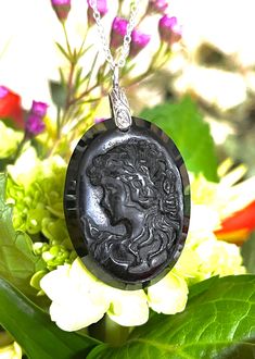 "Big, long, cameo, oval, natural, black onyx pendant necklace set in 925 sterling silver, with 18\" sterling silver chain. Stone Size: 40mm x 30mm. 17 Grams Stone Weight/85-carats." Black Round Cameo Jewelry, Black Intaglio Jewelry As A Gift, Black Cameo Medallion Jewelry, Black Cameo Medallion Necklace, Black Cameo Necklace As A Gift, Black Cameo Jewelry As A Gift, Black Cameo Necklace Gift, Black Cameo Jewelry For Gifts, Black Cameo Necklace For Gift