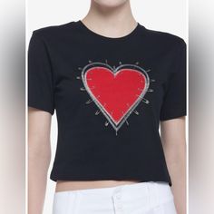 We've All Had Our Hearts Broken! Sometimes It Feels Like They've Been Put Back Together With Safety Pins And Thread. This Cropped Tee Shows An Appliqu Heart With Stitching Around It And Safety Pin Detail. 60% Cotton; 40% Polyester New Without Tags. Bin #1809 Fitted Heart Print Top For Valentine's Day, Trendy Red Top With Heart Print, Fitted Red Heart-shaped Top, Black Heart Print Graphic Tee, Black Graphic Tee With Heart Print, Black Tops With Heart Graphic And Short Sleeves, Black Short Sleeve Top With Heart Graphic, Trendy Short Sleeve Tops With Heart Patch, Trendy Crew Neck Top For Valentine's Day