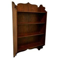 an old wooden bookcase is shown against a white background