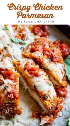 crispy chicken parmesan on top of mashed potatoes and garnished with basil