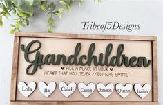 there is a sign that says grandchilden with hearts in the shape of hearts