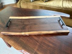 a wooden tray sitting on top of a table