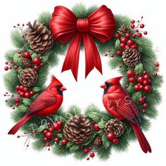 two red birds sitting on top of a christmas wreath with pine cones and holly berries