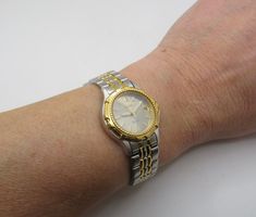 "(F27) Ladies Vintage Gold Plated and stainless steel very well made Dress Watch Japan Movement  By Seiko looks late 90s No matter if you are looking to buy a watch for yourself or as a present, a vintage  piece is always the best choice!  No longer in production,  Tested over 48hrs and working to correct time. cleaned for it new owner. New Seiko Battery fitted it will hold it's value, and may even increase in price. Don't hesitate! Will fit up to 6\"  15.2cms approx max Can be reduced with  link removal. total face  including winder 26.86 mms \"see pics\"  and make your own mind up \"Please see photographs for condition  All the watches are pre owned unless stated otherwise,  they are not new watches & therefore please expect them to be in used condition,  this may include some scratches Seiko Sport, Metal Watch, Made Dress, Mind Up, Watch Gift, Seiko Watches, Sports Watch, Dress Watch, Women Wrist Watch