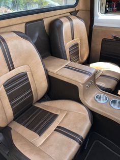 the interior of a vehicle with leather seats