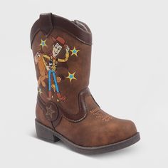 Woody and his pal Bullseye are here to make your little cowboy look adorable with the Toddler Boys' Toy Story Pull-On Boots in Brown. These boots are crafted from a durable material for a lasting use. Not only will these Toy Story pull-on boots provide a super comfy feel but also keep your kid's feet protected. Size: 7. Gender: male. Pattern: Fictitious Character. Vintage Boy Clothes, Toy Story 2nd Birthday Boys, No Heel Boots, Little Cowboy, Disney Shoes, Woody Toy Story, Toddler Boots, Rubber Boot, Second Birthday