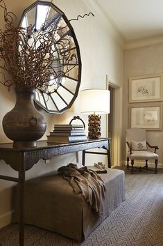 a living room filled with furniture and a large clock