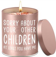 a pink candle with the words sorry about your other children at least you have me