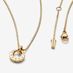 Add a touch of refined luxury to your looks with the Pandora Signature I-D Collier Pendant & Necklace. Crafted from 14k solid gold, this elevated jewelry box staple features a polished pendant that echoes the collection’s architectural round-and-square profile. Three jump rings allow you to adjust the size of the necklace to suit your neckline. Pair it with the Signature I-D bangle and show the world your signature style. - Pandora FINAL SALE - Pandora Signature I-D Collier Pendant & Necklace - Gold Pandora, Pandora Gold, Necklace Clasps, Jewellery Uk, Christmas Gifts For Women, Gold Pendant Necklace, Necklace Sizes, Sterling Silver Charm, Jump Rings