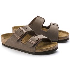 The all-time icon, sized down just for kids. Durable and easy to clean, Birkibuc® gives the two-strap look a brushed, leather-like finish. Complete with classic BIRKENSTOCK design elements, like adjustable buckles and a contoured cork-latex footbed to keep little feet comfortably on the move. Features Contoured cork-latex footbed creates custom support with wear Birkibuc® synthetic leather upper Suede footbed lining helps keep you comfortable EVA sole is flexible and lightweight Two adjustable s Birkenstock Arizona Mocha, Birkenstock Brown, Birkenstock Sandals Arizona, Two Strap Sandals, Birkenstock Sandals, Kids Sandals, Birkenstock Arizona, Birkenstock Shoes, Metal Buckles