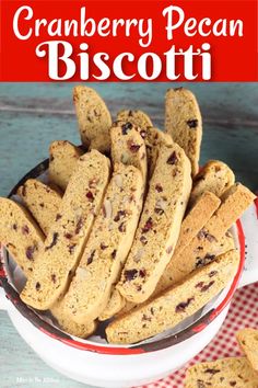 cranberry pecan biscotti in a red and white bowl with text overlay