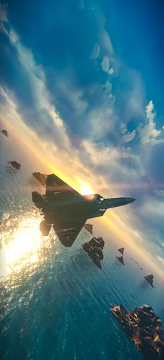 a fighter jet flying over the ocean under a cloudy sky with sun reflecting on it