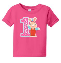 a pink t - shirt with an image of a bunny on the front and number one in