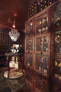 a wine cellar with lots of bottles in it