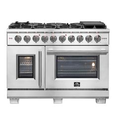 an oven with four burners and two doors on each side, in stainless steel