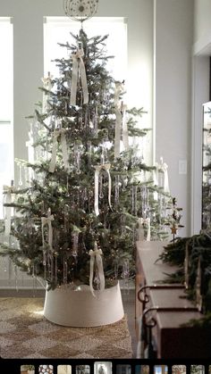 a decorated christmas tree in a living room