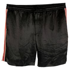 GUCCI 2019 acetate shorts, features a black and gold stripped horsebit print and a lack acetate woven material. Slit Pockets & Drawstring Closure. Made in Italy.Good Conditions. Imperfection for the storage. Marked: 52 Measurements: Waist: 37 inches Rise: 11 inInseam: 8.25 inches Leg Opening: 28 inches Reference: 125984 Category: Shorts More Details Brand: GUCCI Size: 36 Gender: Male Color: Black Color 2: Gold Pattern: Stripe Fabric: Acetate Style: Athletic Condition: AS IS Age Group: Adult Gucci Shorts, Resale Store, Stripe Fabric, Gold Stripes, Gold Pattern, Gucci Black, Striped Fabrics, Color 2, Athletic Shorts