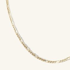 2.6mm Figaro chain crafted in 10k yellow gold with three length options. This brand new chain style is reminiscent of chains of days past and lays on the body like liquid gold. 14k Gold Figaro Chain Link Necklace, Timeless Gold-plated Figaro Chain Necklace, Timeless Figaro Chain Link Necklace, Timeless Figaro Link Chain Necklace, Timeless Figaro Chain Necklace, Yellow Gold Figaro Chain Necklace With Oval Links, Everyday Figaro Chain Necklace In Yellow Gold, Classic Yellow Gold Figaro Chain Necklace, Everyday Yellow Gold Chain Necklace With Figaro Chain