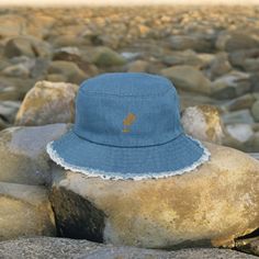 Ready for your next streetwear essential? This denim bucket hat with a frayed brim is a true statement piece--and still has the comfort of being 100% cotton. It is a trendy style that will definitely bring you lots of compliments. Great to protect you at festivals this summer!! * 100% cotton * Denim look * Classic brim with distressed look * 4 sewn eyelets on the sides of the hat * 2 panel design Bucket Hat Summer, Festival Music, Trend 2023, Festival Trends, Denim Bucket Hat, Streetwear Essentials, Hat Summer, Bucket Hats, Trendy Style