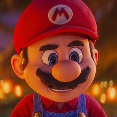 the mario bros character is smiling and wearing overalls