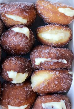 a box filled with donuts covered in icing