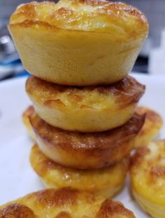 a stack of pastry sitting on top of a white plate