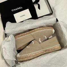 Rare Brand New Chanel Espadrilles In Beige/White 100% Authentic, Bought From Saks The Lid For The Box Got Crushed While I Was Moving, But Everything Else Is In Perfect Condition Comes With Dust Bag Too! Elegant Beige Slip-on Espadrilles, Luxury Spring Flat Espadrilles, Luxury Slip-on Espadrilles For Spring, Luxury Slip-on Espadrilles For Summer, Designer White Espadrilles With Round Toe, Designer Beige Espadrilles For Summer, Luxury Flat Espadrilles For Summer, Luxury Beige Espadrilles With Woven Sole, Luxury Beige Espadrilles With Flat Heel