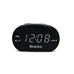 the westclox alarm clock is black with white numbers