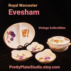 the royal worcester evesham vintage collectibles is displayed on a black background