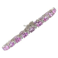 Stamped: 14K White Gold Total Bracelet Weight: 9.0 Grams Bracelet Length: 7 Inches Bracelet Width: 4.00 mm Total Natural Sapphire Weight is 13.50 Carat Color: Pink Total Natural Diamond Weight is 0.60 Carat Color: F-G, Clarity: VS2-SI1 Face Measures: N/A Sku: [702197W] White Gold Diamond Bracelet, Bracelet Tennis, Modern Bracelets, Bracelets Gold Diamond, Tennis Bracelet Diamond, Natural Blue Sapphire, Natural Sapphire, Diamond Bracelets, Emerald Diamond