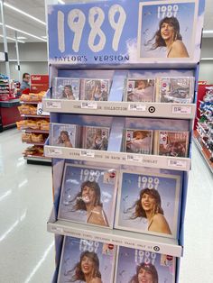 a display in a store filled with pictures of women's hair and hairstyles