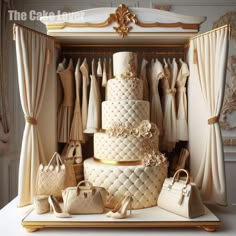 a wedding cake surrounded by handbags and purses