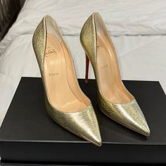 Brand New. Never Worn. Does Not Come In Original Box. Size - 39.5 Final Price Luxury Champagne Heels With Almond Toe, Luxury Champagne Almond Toe Heels, Gold Leather Heels With Red Sole, Luxury Champagne Heels With 4-inch Heel, Gold Heels With Red Sole, Luxury Champagne Heels With Round Toe, Luxury Champagne Heels, Elegant Gold Heels With Red Sole, Luxury Champagne 4-inch Heels