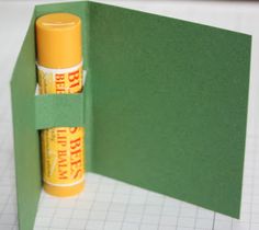 an open book with two lip bales in the front and one on the inside