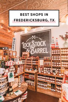 the inside of a store with lots of items on shelves and signs above it that read, stock & barrel