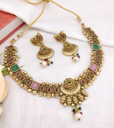 Gray Rajwadi Gold Necklace / Kundan Multicolor Necklace / Rajasthani Temple Jewelry / Handmade Rajwadi Golden Traditional Necklace Features Made in Brass with 22 karat Gold plating with Kundan stones and colored beads Handcrafted To Perfection Light Weight Jewelry Perfect For Indian Weddings And Celebrations Necklace: Adjustable Fitting around the neck with Golden extension dori Earrings: 2.5 Inches Earrings come with push back closure Facebook: www.facebook.com/shoparyafashions Pinterest: www.p Multicolor Necklaces With Latkans For Festive Occasions, Multicolor Latkans Necklace For Festive Occasions, Festive Multicolor Necklace With Latkans, Elegant Multicolor Latkans Necklace, Multicolor Dual-tone Kundan Necklace For Celebration, Multicolor Necklaces With Latkans For Gifts, Gift Multicolor Necklaces With Latkans, Multicolor Dual-tone Necklaces For Festivals, Festive Multicolor Dual-tone Necklaces