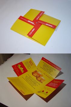 an open yellow brochure with red ribbon on it