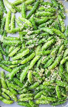 green beans with parmesan sprinkles on a plate