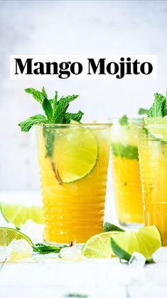 two glasses filled with lemonade, lime and mint garnish on a table