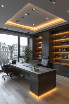 an office with wooden flooring and built in shelving units on either side of the desk