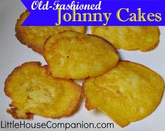 some fried food on a white plate with the words old fashioned johnny cakes