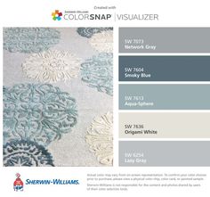 the color scheme for an area rug is shown in shades of blue, gray and white