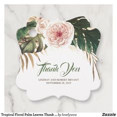 a thank card with flowers and leaves on it