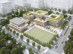 an aerial view of a soccer field and buildings