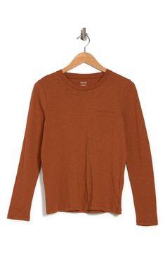 Perfect for styling versatile looks, this long sleeve T-shirt is a wardrobe essential. 23 1/2" length (size Medium) Crewneck Long sleeves Chest patch pocket 100% cotton Machine wash, dry flat Imported Women's Clothing Casual Brown T-shirt For Fall, Fall Casual Crew Neck T-shirt, Casual Crew Neck T-shirt For Fall, Basic Brown Relaxed Fit Tops, Basic Brown Tops With Relaxed Fit, Casual Crew Neck Tops For Fall, Solid Color T-shirt For Fall Layering, Fall Layering T-shirt, Fall Layering Solid Color T-shirt