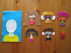 some paper cut outs with different faces on them